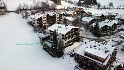 an aerial view of a resort in the snow at Apartment Weisswand in Colle Isarco