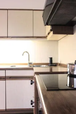 a kitchen with a sink and a counter top at haus e Apartment 1 in Lana