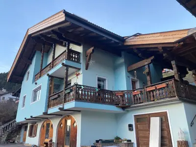 a house with balconies on the side of it at CASA BAMBA in Tesero