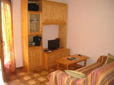 a living room with a couch and a table at Casa Erica - Carano in Carano