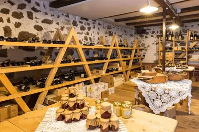 a room with wooden shelves with hats on them at Gasthof zur Krone in Aldino