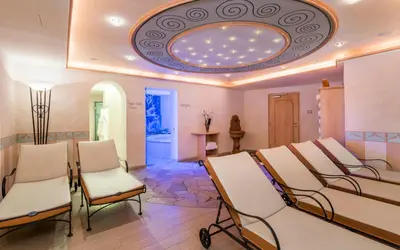 a salon with a row of chairs and a ceiling at Stoa - Elegant & Romantic Guest House - 