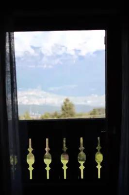 a window with a view of the sky at mösslerhof in Aldino