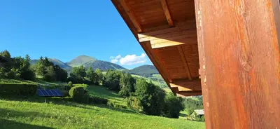 a house with a view of a mountain at Residence Rastbichl - Apartments & Indoor-Pool in Maranza