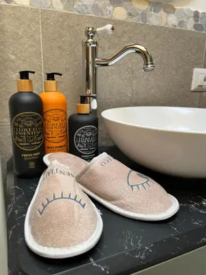 a bathroom with a sink and a glass shower at AE 1793 - Arabba in Livinallongo del Col di Lana