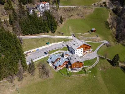 an aerial view of a large house on a hill at AE 1793 - Arabba in Livinallongo del Col di Lana