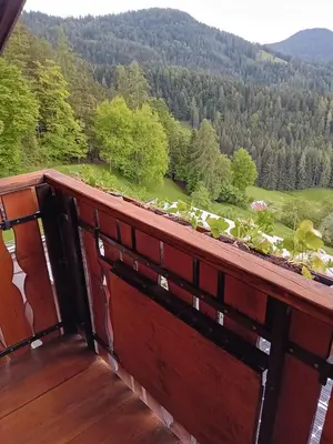 a balcony with a view of a mountain at Eggernhof in Lauregno
