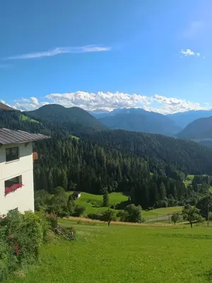 a view of the mountains from a house at Eggernhof in Lauregno