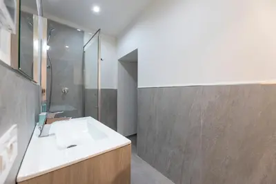 a bathroom with a sink and a shower at Casa di Gio in Cavalese