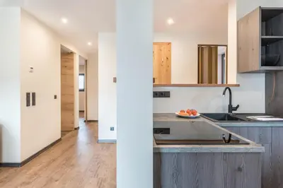 a kitchen with a sink and a counter top at Villa Lara Zirbe in Castelrotto