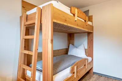 a bunk bed in a tiny house at Villa Lara Zirbe in Castelrotto