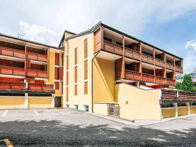 a building with balconies on the side of it at Apartment Condominio Val di Fassa-2 by Interhome in Alba di Canazei