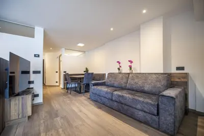 a living room with a couch and a table at Apartment Villa Hetty 2 in Ortisei