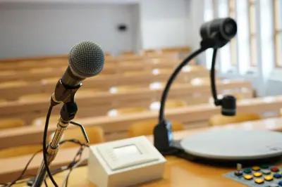 a microphone sitting on a table in a classroom at Priesterseminar Brixen in Bressanone