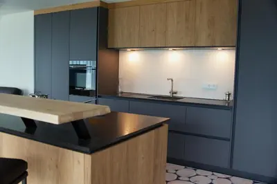 a kitchen with a sink and a counter top at Monte Sole Suite - mit Sauna & Garten in Perca