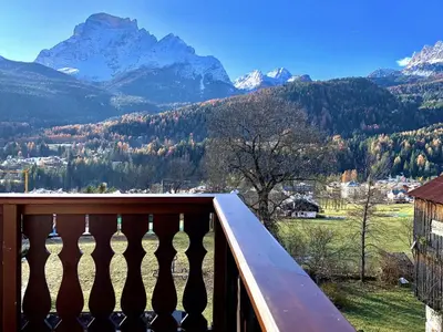 a balcony with a view of a mountain at Appartamento ampezzano con ampia balconata in San Vito di Cadore