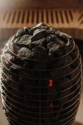 a close up of a stack of black food at Hotel Recort - Adults Only in Colfosco