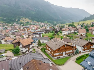 an aerial view of a village in the mountains at Casa Cielo Azzurro in Moena