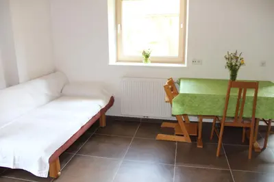 a living room with a couch and a table at Haus Valier Tiers in Tires