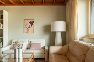 a living room with a couch and a table at 240qm Luxus Apartment - Natur & Wandern zw Bozen und Meran in Nalles