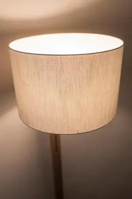 a close up of a wooden table lamp at Alte Schmiede Apartments & Rooms in Bolzano