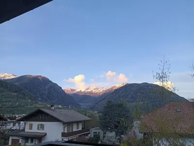 a view of the mountains from a house at Appartement Margarethen in Vipiteno