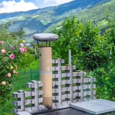 a fence with a mushroom on top of it at Biohof Gala in Naturno