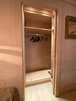 a walk in closet in a room at Villa Zubiana in Cortina dʼAmpezzo