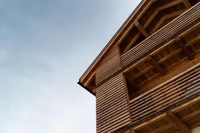 a wooden building with the sky in the background at Chalet Lumis in San Vigilio Di Marebbe