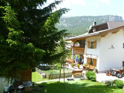 a house with a view of a yard at Elmes in La Villa