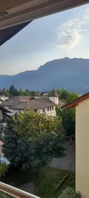 a view from a window of a house with trees at Haus Tauber in Cornaiano
