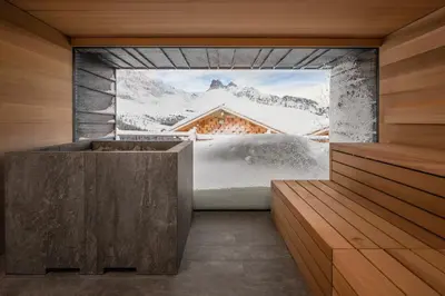 a bathroom with a view of a snow covered mountain at Zallinger Dolomites in Seiser Alm