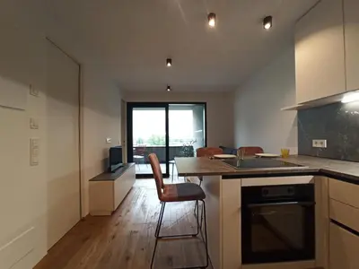 a kitchen with a sink and a counter top at Nido City Studio in Brixen