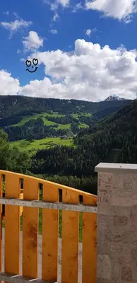 a view of a mountain with the olympic rings in the sky at Lexhof in Mareta