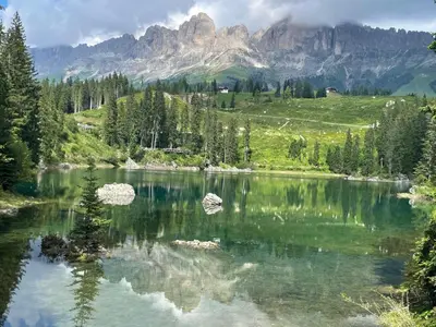 a view of a lake with mountains in the background at Casa Canazei, 2-5 pers Appartement 122 in Canazei