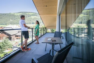 two people standing on top of a snow covered mountain at Montanaris Alpine - Active - Relax in Villabassa