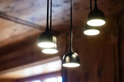 a row of lights hanging from a ceiling at Pramian1394 in Cermes