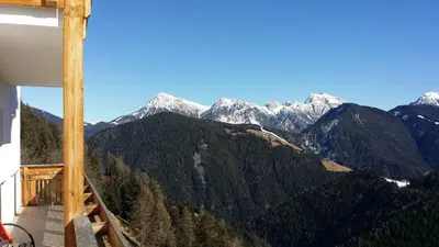 a view of a mountain range with snow covered mountains at Lüch da Börz in Antermoia