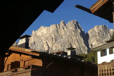 a view of a mountain from the roof of a building at Verocai Views by WelcHome in Cortina dʼAmpezzo