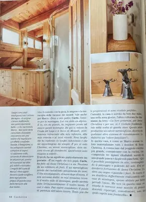 a article in a magazine about a bathroom in a house at Cà Bianca delle Dolomiti in Cortina dʼAmpezzo