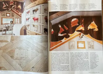 a page of a magazine with a drawing of a house at Cà Bianca delle Dolomiti in Cortina dʼAmpezzo