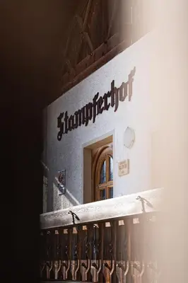 a sign on the side of a building at Stampferhof - Agriturismo in Racines