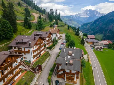 an aerial view of a village in the mountains at Appartamento Boè Arabba in Livinallongo del Col di Lana