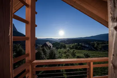 a view from the window of a cabin with a view of the mountains at Sonus Alpis - Adults Only in Castelrotto