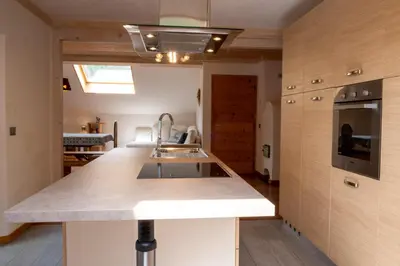 a kitchen with a sink and a counter top at Cèsa Cianacei Prestige in Canazei