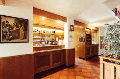 a restaurant with a pharmacyacistacistacistacistacist at Pension Stern in Aldino