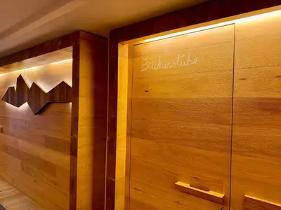 a wooden elevator with the word bloxbridge on it at Die Bücherstube im living Kampill in Bolzano