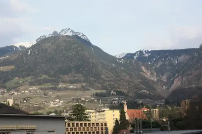 a view of a city with mountains in the background at Appartamento Adele in Merano