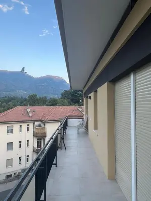 a balcony with a view of a building at Appartamento Adele in Merano