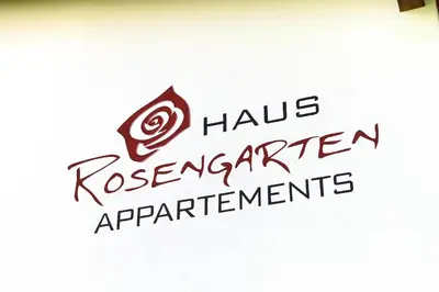 a sign with the words haulsoren operator applications at Haus Rosengarten in Tirolo